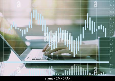 Forex trading. Woman working with laptop in office and chart, closeup Stock Photo