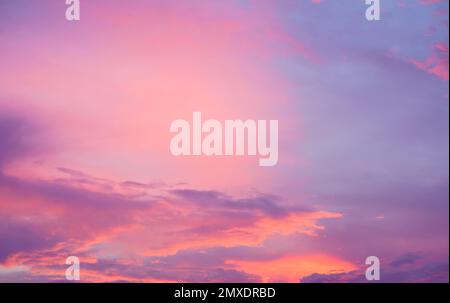 beautiful twilight sky golden hour sunset and cloud with purple violet sweet pastel color atmosphere background.idea for wallpaper,vintage or retro,he Stock Photo