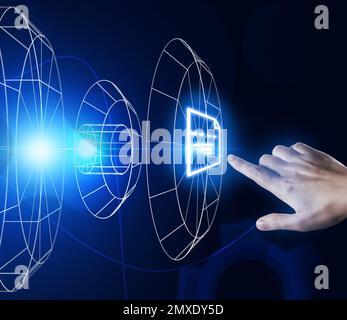 Man clicking on document icon using virtual screen, closeup Stock Photo