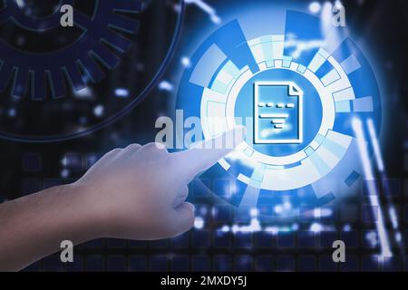 Man clicking on document icon using virtual screen, closeup Stock Photo