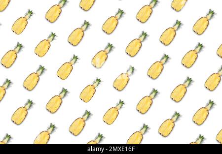 Pattern of pineapple halves on white background Stock Photo