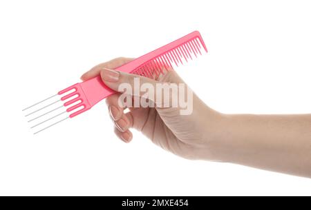 Woman holding pin tail comb on white background, closeup Stock Photo