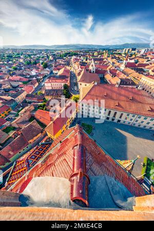 Aerial cityscape photography. Sunny evening view of Altemberger House - Sibiu History Museum. Picturesque cityscape of Sibiu town. Attractive summer s Stock Photo