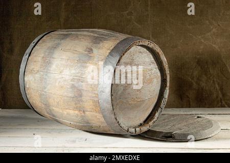 an old oak wine barrel lying on its side Stock Photo