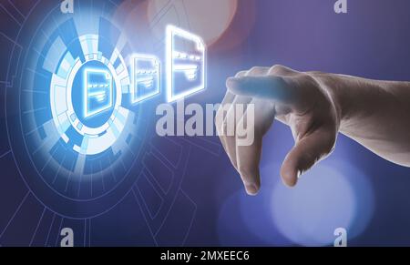 Man clicking on document icon using virtual screen, closeup Stock Photo