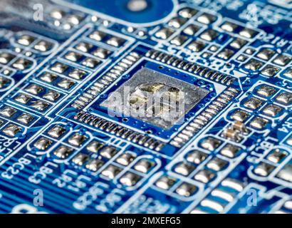 Closeup of electronic elements embedded into PCB board Stock Photo