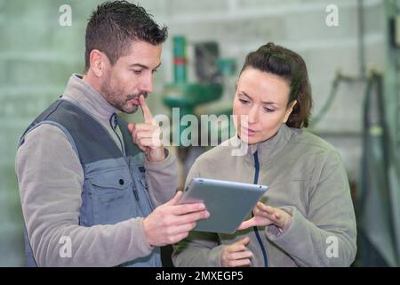 workers are sharing their ideas Stock Photo