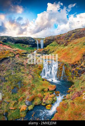 Aerial landscape photography. Colorful view from flying drone of Sheep's Waterfall. Amazinf summer scene of Iceland, Europe. Beauty of nature concept Stock Photo