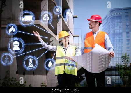 Multiple exposure of engineers, scheme and cityscape Stock Photo