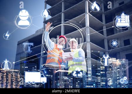 Multiple exposure of professional engineers, scheme and unfinished building Stock Photo