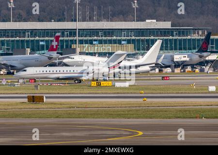 Zurich, Switzerland, January 20, 2023 Bombardier Global 6000 business aircraft is taxiing to its position Stock Photo