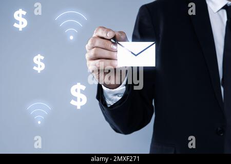 Electronic mail. Businessman and virtual screen with different icons, closeup Stock Photo