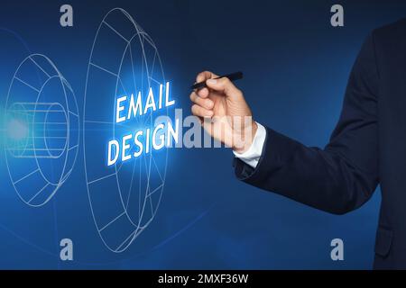 Businessman pointing at phrase EMAIL DESIGN on virtual screen, closeup Stock Photo