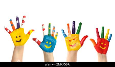 School holidays. Children with painted palms on white background, closeup Stock Photo