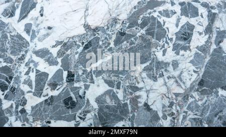 Gray and white rough grainy stone texture background. Stock Photo