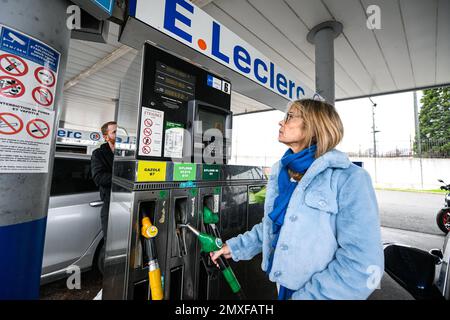 Sp95 Gas Illustration picture shows a person using a petrol pump (unleaded fuel ...