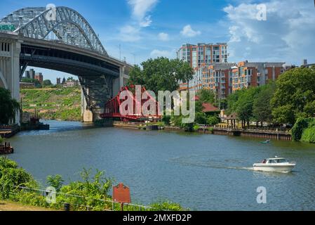 Two bridges over the Cuyahoga River in Cleveland, Ohio; the high-level Detroit-Superior Bridge, and the lower Center Street swing bridge, positioned t Stock Photo