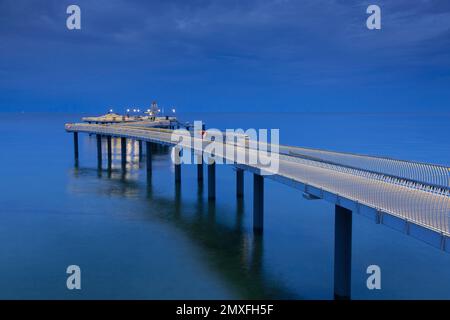 Koserow Pier / Seebrücke at dusk on Usedom island in the Baltic Sea, Mecklenburg-Vorpommern, Germany Stock Photo