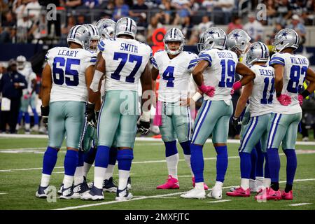 Dallas Cowboys quarterback Dak Prescott (4) scrambles before throwing a  pass during an NFL football game against the Detroit Lions in Arlington,  Texas, Sunday, Oct. 23, 2022. (AP Photo/Tony Gutierrez Stock Photo - Alamy