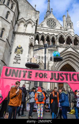 Extinction Rebellion protest 'Unite for Justice', an action to raise the alarm on the UK justice system, Royal Courts of Justice, London, England, UK Stock Photo
