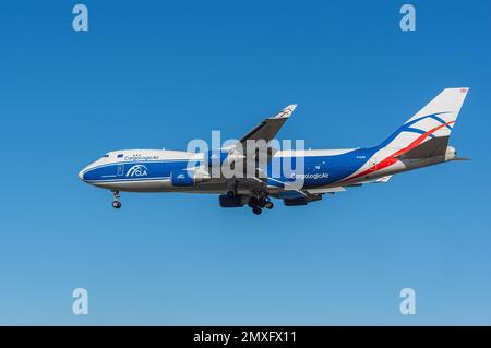 Cargologicair Boeing 747-428ERF with registration G-CLBA shown approaching LAX for landing. Stock Photo