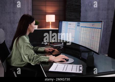 Account Manager In Office Coding Medical Bill Stock Photo