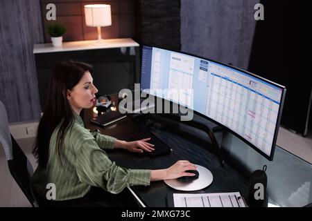 Account Manager In Office Coding Medical Bill Stock Photo