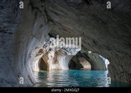 Kayak tour around the famous marble caves Catedral de Marmol, Capilla de Marmol and the tunnel of marble right after sunrise - Traveling Chile Stock Photo