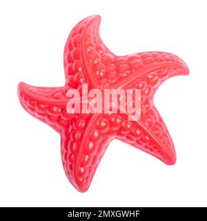 Red plastic starfish isolated on white background Stock Photo