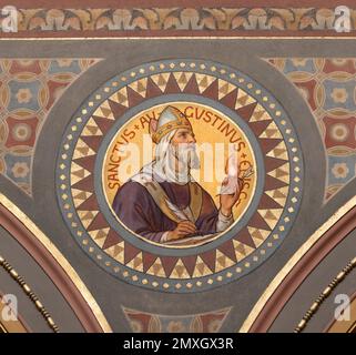 BERN, SWITZERLAND - JUNY 27, 2022: The fresco of St. Augustine in the church Dreifaltigkeitskirche by August Müller (1923). Stock Photo