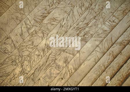 Ancient Wooden Gate with Metal decor on wooden cubes. Detail of a door in brown wood with silver motifs made with a lot of art .Highlight for the knob Stock Photo