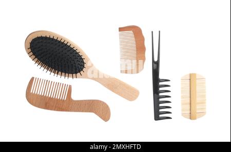 Set of professional hair combs and brush isolated on white, top view Stock Photo