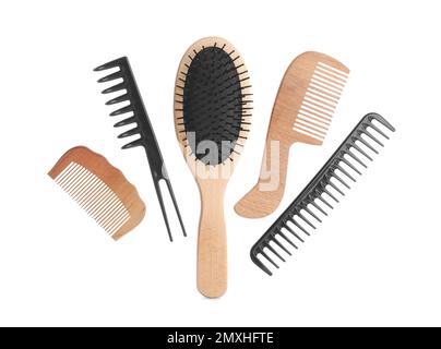 Set of professional hair combs and brush isolated on white, top view Stock Photo