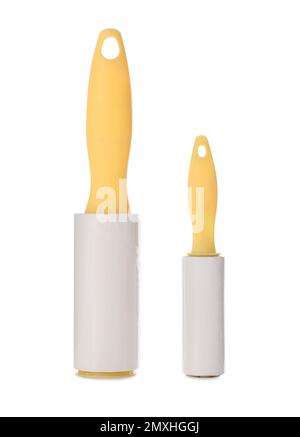 Different lint rollers with yellow handles isolated on white Stock Photo