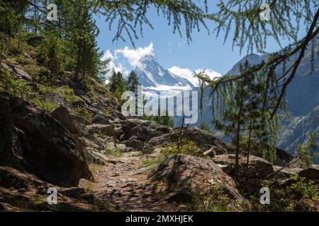 The Matterhorn peak over the Mattertal valley in Walliser aslps from Europaweg tour. Stock Photo