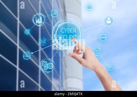 Cyber security concept. Man pressing virtual button, closeup Stock Photo