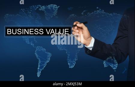 Business value concept. Man using virtual screen Stock Photo