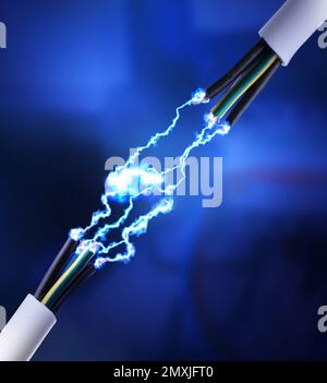 Sparking cables on dark blue background, closeup. Electrician's supply Stock Photo