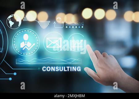 Consulting concept. Businessman pointing on blurred background, closeup Stock Photo
