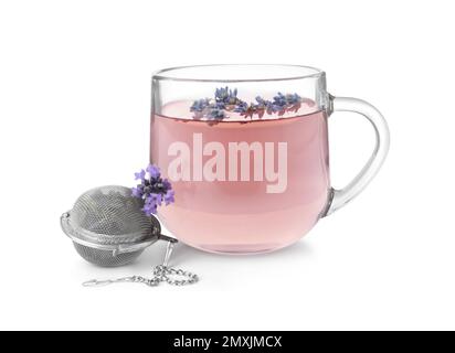 Fresh delicious tea with lavender, strainer and beautiful flowers on white background Stock Photo