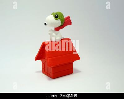 Snoopy the dog dressed as aviator with his friend Woodstock. Comic Peanuts. Stock Photo