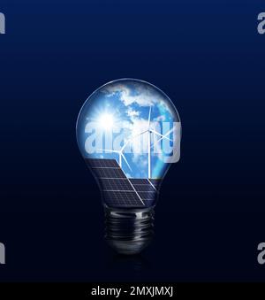 Alternative energy source. Light bulb with solar panels and wind turbines on blue background Stock Photo