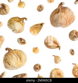 Dried fig fruits falling on white background Stock Photo
