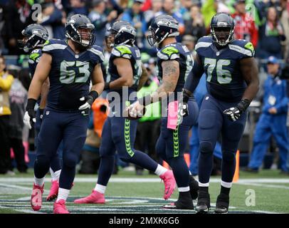 Atlanta Falcons guard Germain Ifedi (74) watches before a