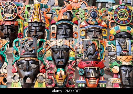 Masks, handicrafts, souvenirs, in the entrance area of the Mayan ruins of Chichén Itzá, Chichén Itzá, Yucatán, Mexico, Central America Stock Photo