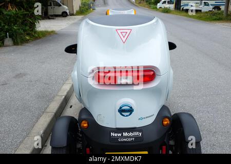 A tiny two-seat electric car made by Nissan. Stock Photo