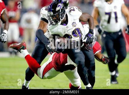 Los Angeles Rams running back Wendell Tyler (26) is thrown for 4