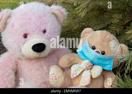 medical mask on a teddy bear close-up Stock Photo
