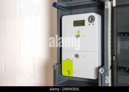 Smart meter or digital energy meter to determine household energy consumption. Stock Photo