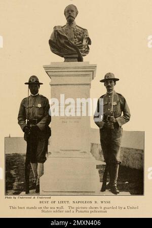 Bust of Lieut. Napoleon B. Wyse This bust stands on the sea wall. The picture shows it guarded by a United States soldier and a Panama policeman from the book Panama and the Canal in picture and prose : a complete story of Panama, as well as the history, purpose and promise of its world-famous canal the most gigantic engineering undertaking since the dawn of time by Willis John Abbot,1863-1934 Published in London ; New York by Syndicate Publishing Co. in 1913 Stock Photo